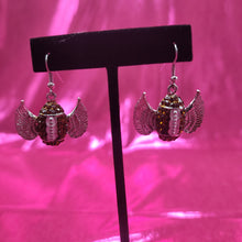 Load image into Gallery viewer, Sparkly Winged Football Earrings
